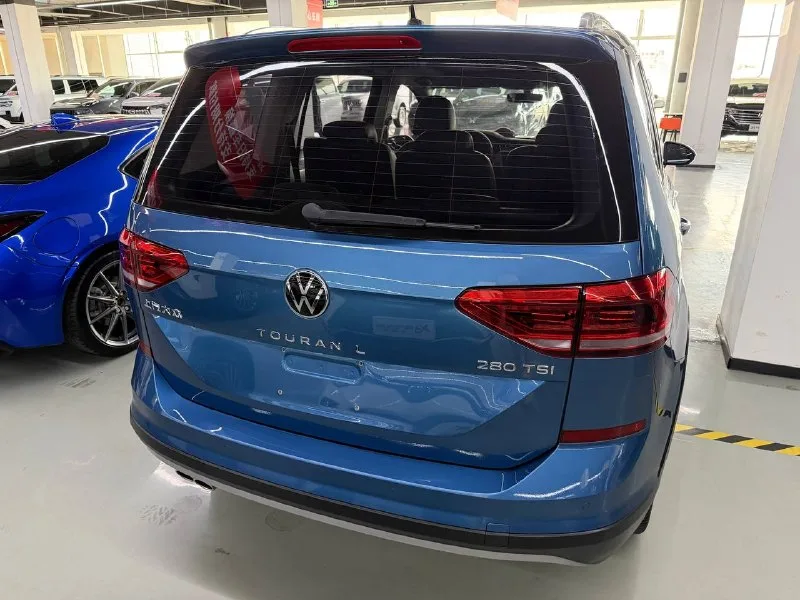 Volkswagen Touran 2021 — фото 5